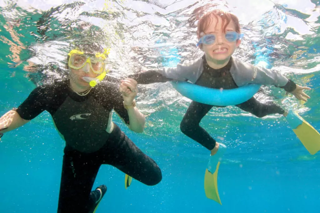 Mum and son snorkelling on The Great Barrier Reef from Port Douglas